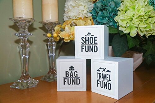 Three decorative fund boxes labeled Shoe Fund, Bag Fund, and Travel Fund, with flowers and candles.